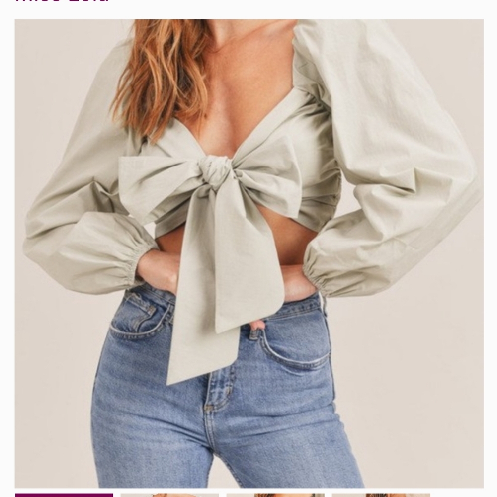Crop top with bow tie in Breast area like new